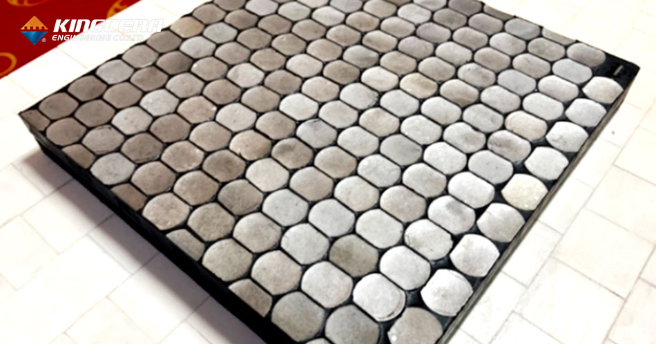 Titanium carbide and rubber wear liner